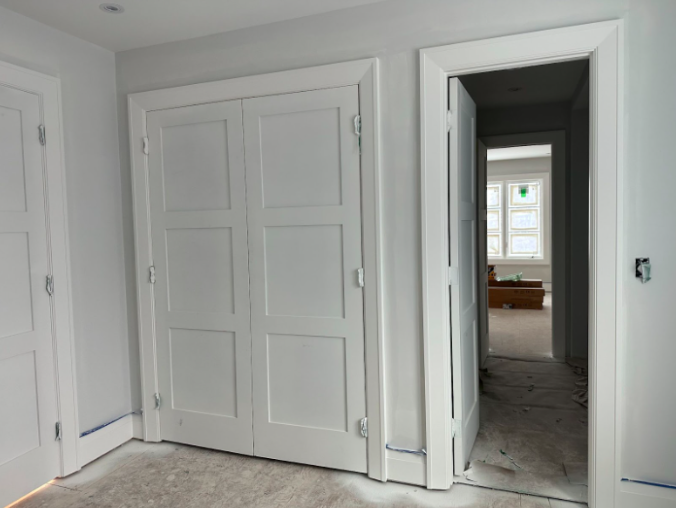 a white door in a room